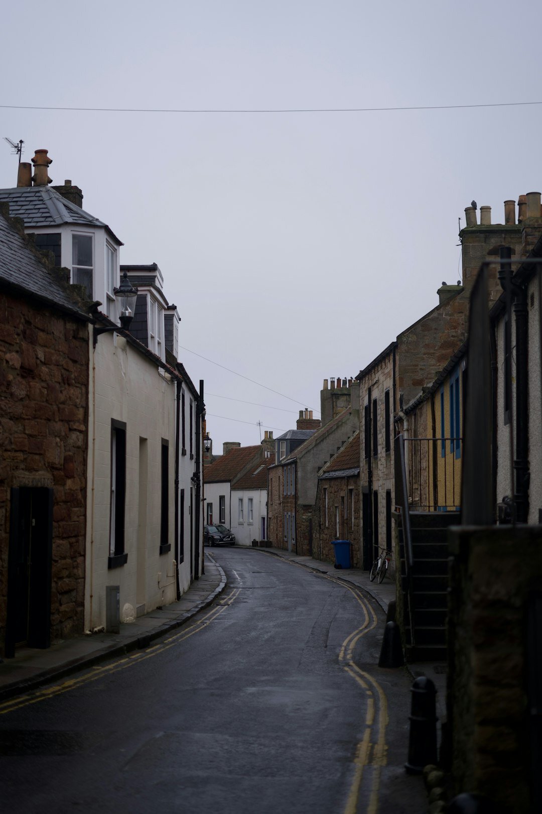 Quiet residential street in a Danish coastal town in soft morning light