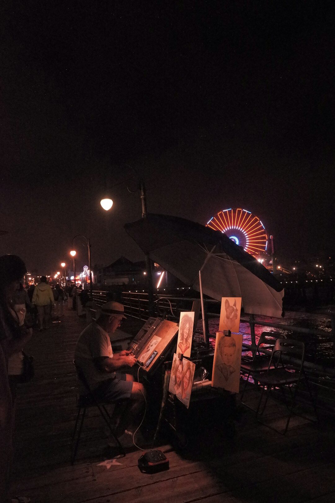 man painting at night